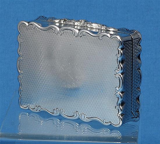 A Victorian silver rectangular table snuff box, by Yapp & Woodward, Length: 102mm Weight: 8.8oz/274grms